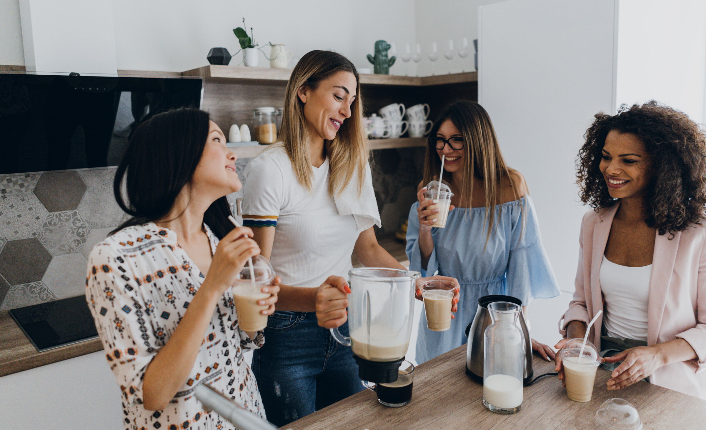 Women friends drinking ice coffee